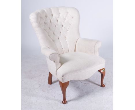 A VICTORIAN STYLE BUTTON BACK EASY ARMCHAIROn stained beech cabriole supports, 72cm wide; 93cm high