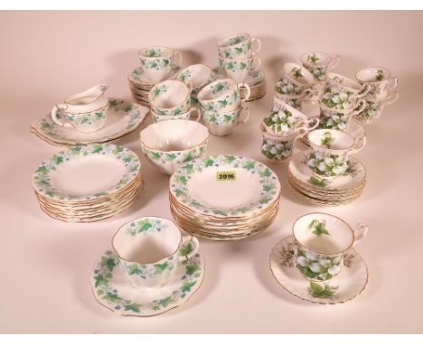 CERAMICS, A ROYAL CROWN DERBY PART TEA SERVICE AND A ROYAL ALBERT PART TEA SERCICE.