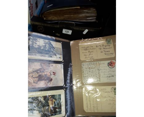 A box containing 5 binders of vintage postcards 