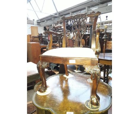 A child's reproduction mahogany armchair in the Chippendale style, height 64cm. 