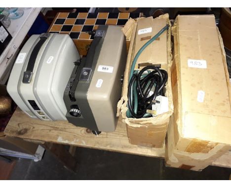 Four assorted vintage projectors. 
