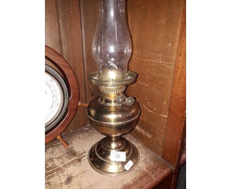 A brass paraffin lamp with glass funnel 