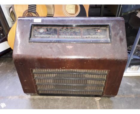 A vintage KB wood veneer cased radio 