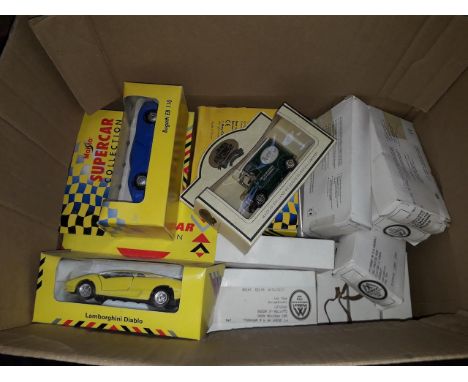 A box of boxed model cars including Maesto 