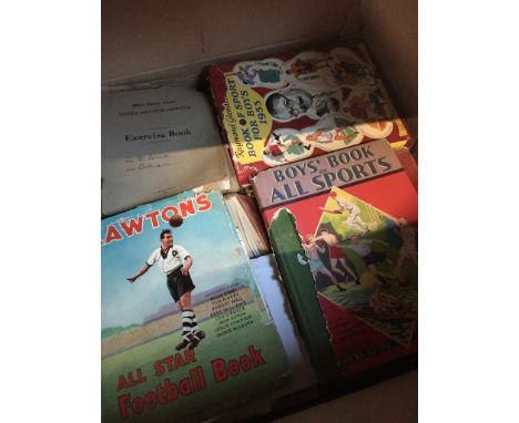 A box of vintage books, including sports books and school excercise books 