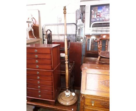 A turned stained beech standard lamp. 