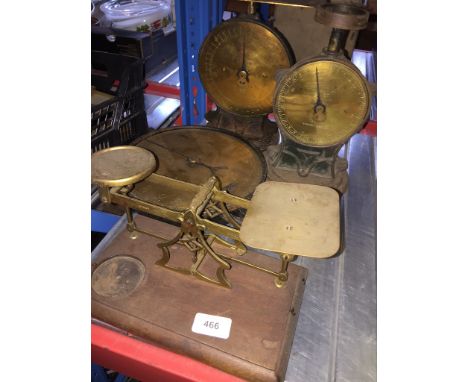 A set of letter scales and three brass Salter scales (one hanging scale) 