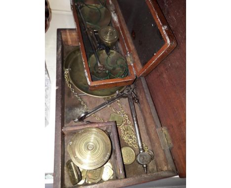 Two pairs of folding brass scales in mahogany boxes 