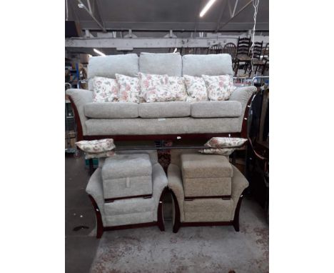 A three piece suite with two pouffes and cushions, one armchair and pouffe is different colour 