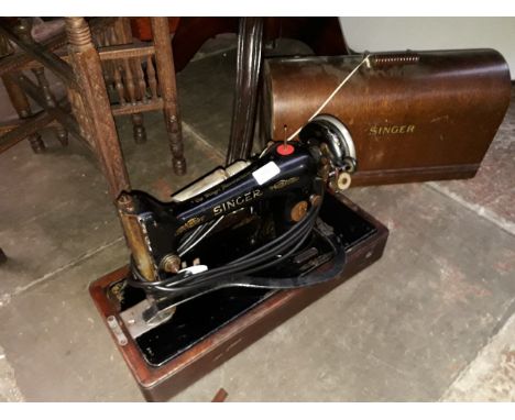 A vintage cased Singer electric sewing machine - B.U.K 12E 