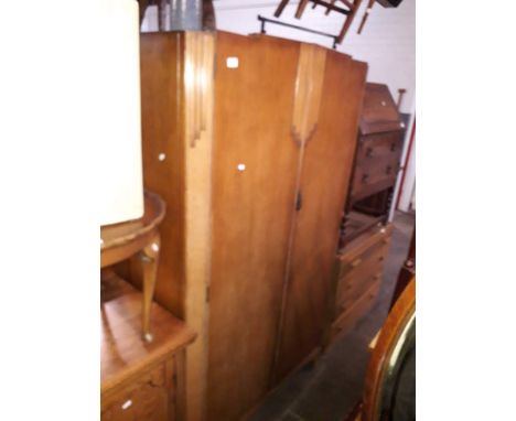 A 1930s Art Deco style oak wardrobe.Dimensions: H187cm, W117, D47cm.