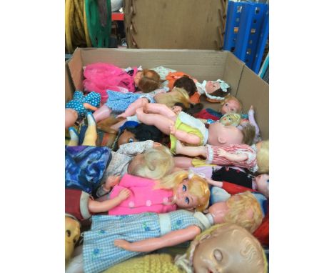 A box of vintage dolls 