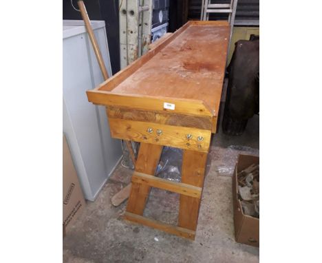A large pine work bench 