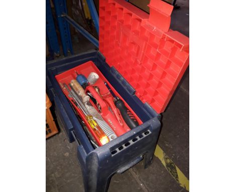 A toolbox seat with tools 