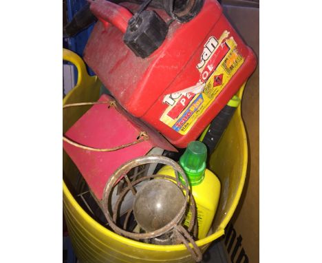 A plastic bucket containing electric hedge trimmer, inspection light, loppers, Bosch charging dock etc 