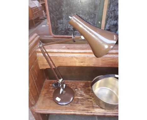 An Anglepoise lighting Ltd. brown Anglepoise lamp. 