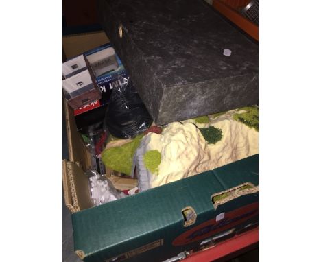 A box of model railway trackside items 