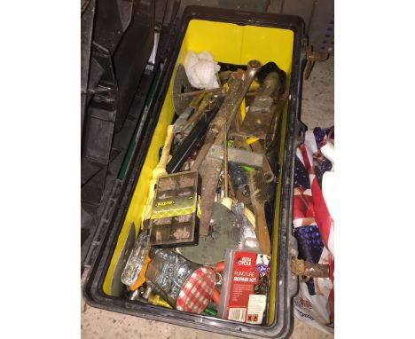A Stanley toolbox with various tools 