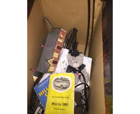 A box of model railway track, Gaugemaster train controller, 2 maintenance books for Morris Minor 1000 and Hillman Minx etc 
