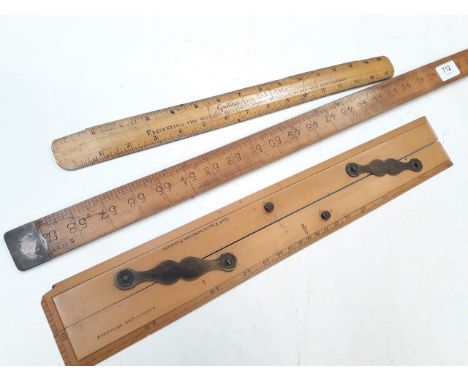A vintage wooden 60 inch rule, a 12" rule and a parallel 