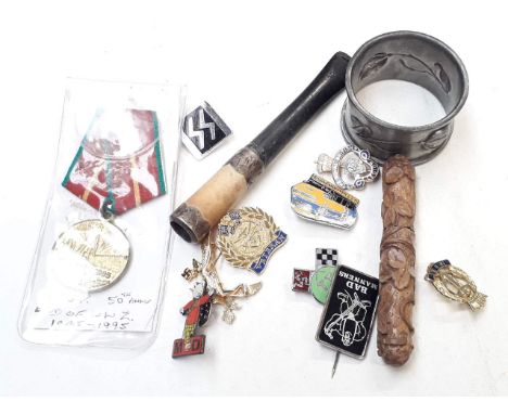 A mixed lot including an Arts &amp; Crafts pewter serviette ring, a cheroot holder, a carved needle case, a USSR post WWII me