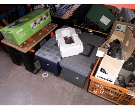 A collection of tools including 3 tool boxes, tiling kit, circular saw, sander and a bucket of hand tools 