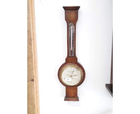An oak cased barometer by Short &amp; Mason, London. 