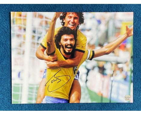 Socrates signed 16x12 colour photo pictured while Captain of Brazil during the 1982 World Cup Finals in Spain. Socrates Brasi