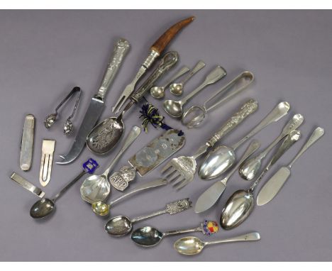 Two Georgian silver dessert spoons; two silver butter knives; five various condiment spoons; a pair of snail tongs; another p