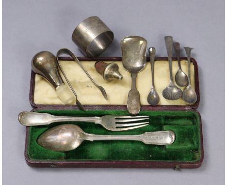 A Victorian silver Fiddle pattern caddy spoon with shovel bowl, London 1859 by Haynes &amp; Carter; A George III Fiddle-&amp;