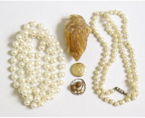 A cultured pearl necklace; a simulated pearl necklace; a small yellow metal circular locket; &amp; a silver twist-design ring