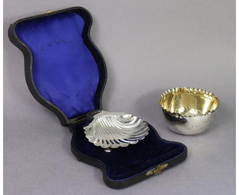 An Edwardian silver butter dish of scallop shell design, with three ball feet, Birmingham 1904 by W. Hutton &amp; Sons Ltd, 1