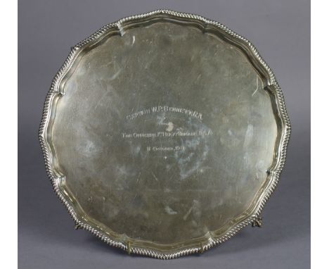 A George V silver salver with gadrooned rim to the raised pie-crust border, engraved inscription: “Captain W. P. Bennett RA, 