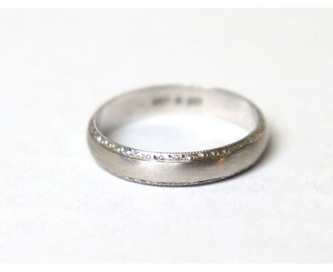 A platinum band with satin finish &amp; narrow decorative borders, size R, 4.7g.