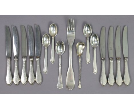 Nine Danish Art Deco steel dessert knives with .826 standard handles, Copenhagen 1927-29; four similar teaspoons, 1946; two s