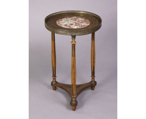 A late 19th/early 20th century French small circular lamp table inset rouge marble to the brass-inlaid top, with pierced gall