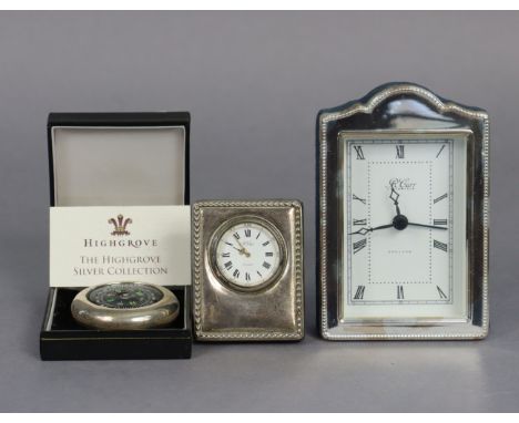 A modern quartz timepiece in rectangular silver-mounted plush case, 4½” high, Sheffield 1998; a similar travelling timepiece,