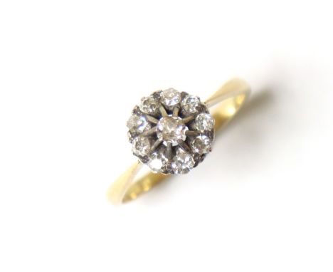 An 18ct gold ring set cluster of small diamonds, size Q, weight 2.4g.