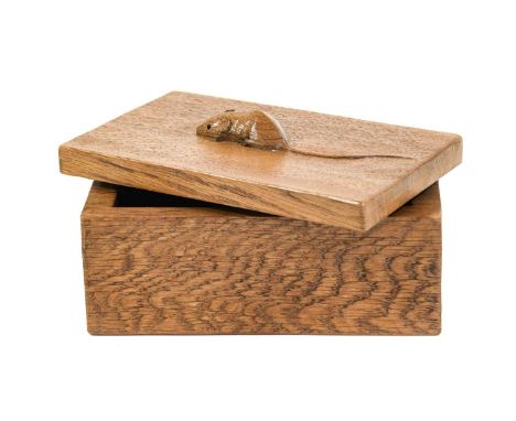 Workshop of Robert Mouseman Thompson (Kilburn): An English Oak Trinket Box and Cover, of rectangular form, the cover with car