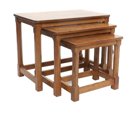 Workshop of Robert Mouseman Thompson (Kilburn): An English Oak Nest of Three Tables, adzed rectangular tops, on four octagona