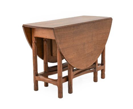 Stanley Webb Davies (1894-1978) of Windermere: An English Oak Gate Legged Dining Table, 1954, the oval top, on eight octagona