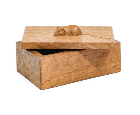 Workshop of Robert Mouseman Thompson (Kilburn): An English Oak Trinket Box and Cover, of rectangular form, the cover with car