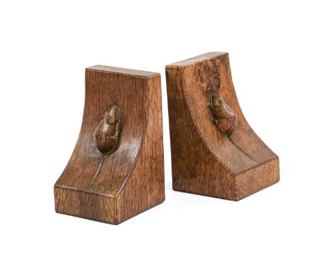 Workshop of Robert Mouseman Thompson (Kilburn): A Pair of English Oak Single Mouse Bookends, each with carved mouse trademark