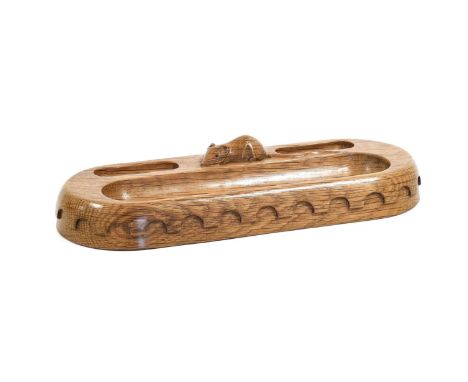 Workshop of Robert Mouseman Thompson (Kilburn): An English Oak Pen Tray, oblong with penny moulding, three sections, with car
