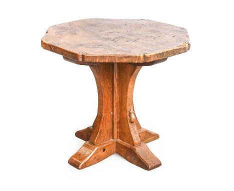 Robert Mouseman Thompson (1876-1955): A Burr Oak Octagonal Coffee Table, 1930s, with mouse tails to each corner, on a crucifo