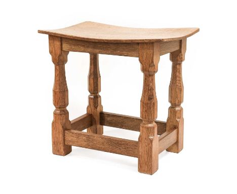 Workshop of Robert Mouseman Thompson (Kilburn): An English Oak Dish Top Stool, the rectangular nailed and adzed top, on four 
