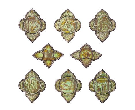 Eight Victorian Stained, Painted and Leaded Glass Quatrefoil Tracery Panels, depicting and inscribedVenble Bede dictating the
