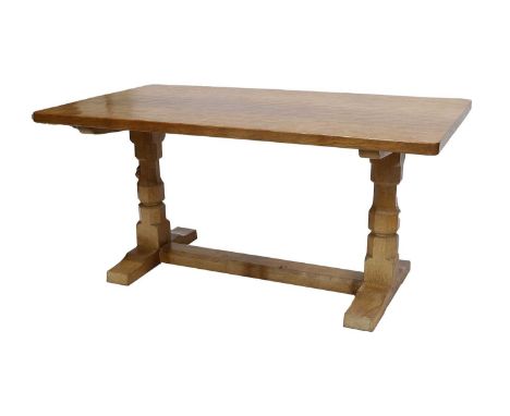 Workshop of Robert Mouseman Thompson (Kilburn): An English Oak 5ft Refectory Dining Table, 1969, adzed top, on two octagonal 