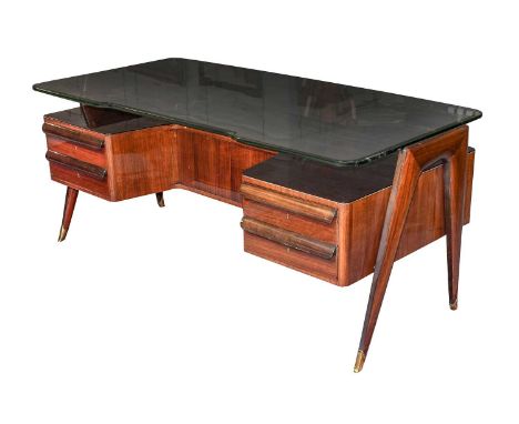An Italian Floating Glass and Indian Rosewood Executive Desk, circa 1950s, designed by Vittorio Dassi (1893-1973), the thick 