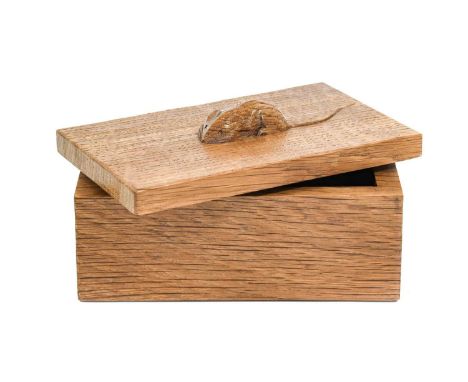 Workshop of Robert Mouseman Thompson (Kilburn): An English Oak Trinket Box and Cover, of rectangular form, the cover with car